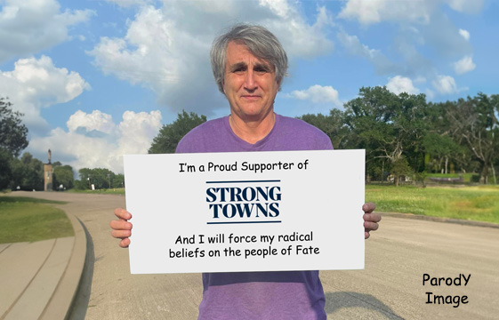 David Billings holding card in support of Strong Towns